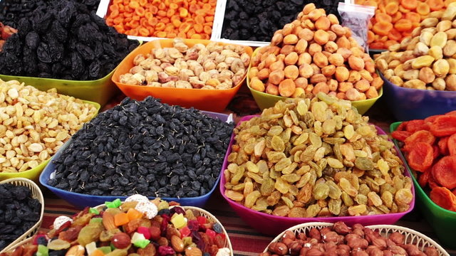 Assortment of dried fruits and nuts at a market