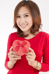 Woman hands holding a gift