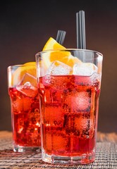 spritz aperitif aperol cocktail glasses with orange slices, ice