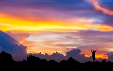 Silhouette of photographer at  mountain with beautiful  sunset s