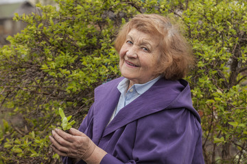 An elderly woman model in the garden