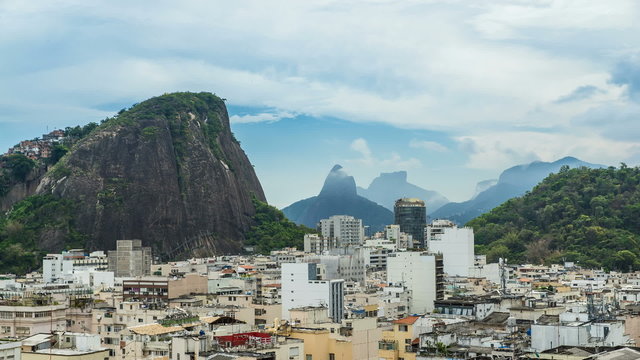 High mountains of Rio De Janeiro looking from Copacabana Beach rooftops in Brazil.