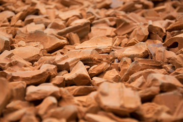Conceptual image of red bricks pile