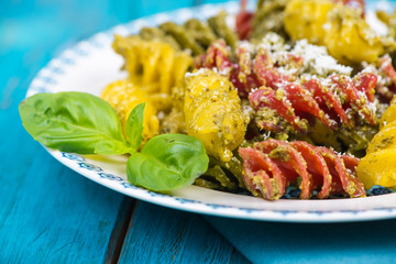 homemade pasta with pesto in vibrant colors
