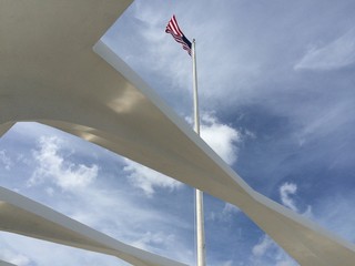 U.S. Flag flies above the Arizona Memorial at Pearl Harbor