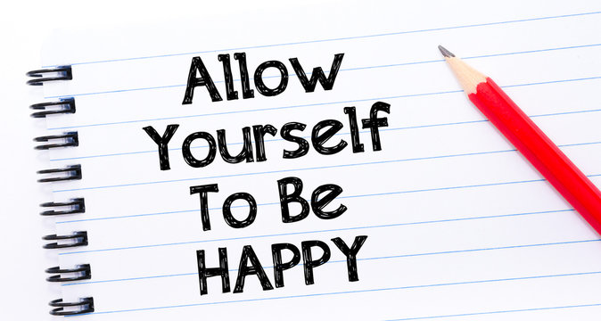 Allow Yourself To Be Happy Text written on notebook page