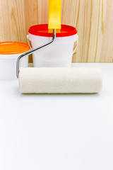 roller with paint cans ready for use