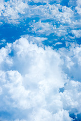 Aerial view of Blue sky and Cloud Top view from airplane window,