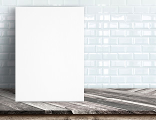Black White paper poster lean at white ceramic tile wall and tro