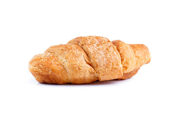 Tasty croissant on a white background.