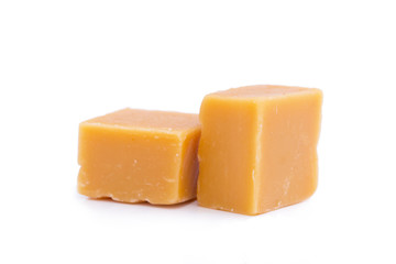 Tasty toffees on a white background.