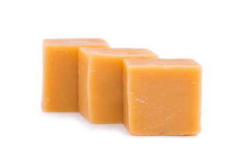 Tasty toffees on a white background.