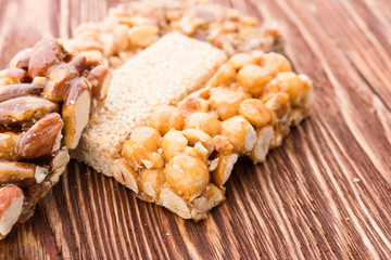 Peanut brittle sweet hard on wooden table