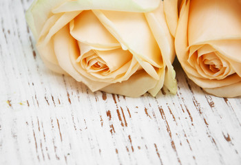 Roses on a wooden table