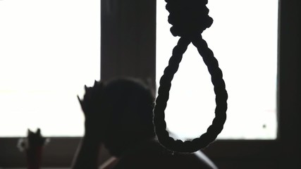 suicide, depressed man, gallows noose around his neck