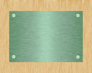 Obraz premium Green metal plate on board.