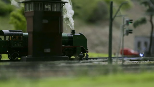 Model of a steam locomotive with smoke