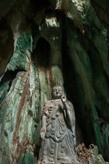 Fototapeta na wymiar Statue of Budda in Marble Mountains, Vietnam