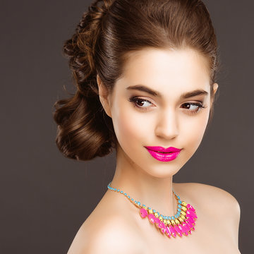 Beautiful Surprised Woman. Perfect Fashion Makeup and Hairstyle