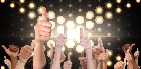 Composite image of hands showing thumbs up - Powered by Adobe