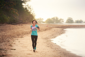 girl runs on beach at low tide