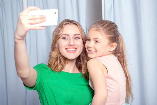 Young Woman Making Selfie In A Fitting Room