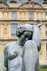 Fototapeta na wymiar Paris - Bronze sculpture The Night by Aristide Maillol in Tuileries garden