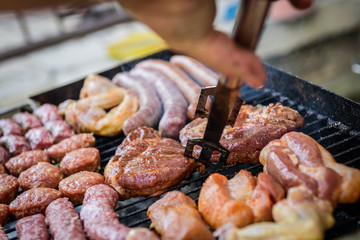 Raw Meat skewer on barbecue grill with coal