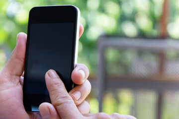 Image of man checking his phone