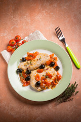 escalope with tomatoes olives and thymus