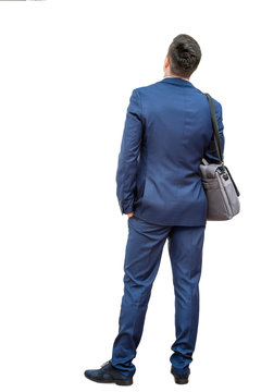 Rear view of businessman in suit.
