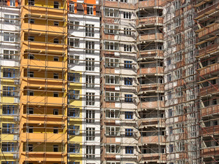 windows and balcony facade of modern apartment house constructio