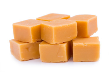 Tasty toffees on a white background.