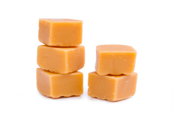 Tasty toffees on a white background.