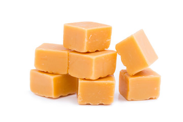 Tasty toffees on a white background.