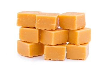 Tasty toffees on a white background.