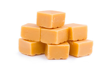 Tasty toffees on a white background.