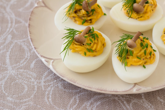 Stuffed eggs with mushrooms, green onions, dill and mayonnaise