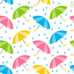 Fototapeta na wymiar Seamless pattern with color umbrellas 