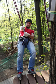 Man with climber equipment