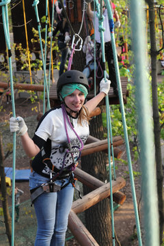 Teen climbing the rope