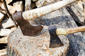 two axes in block for chopping firewood