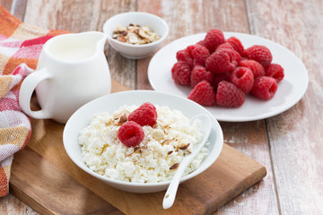 cottage cheese with fresh raspberry and milk