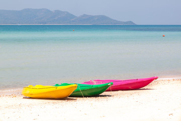 Fototapeta na wymiar colorful kayak on beach