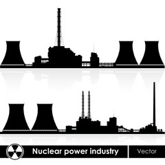 Naklejka premium Nuclear power plants silhouettes isolated on white.