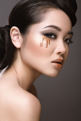Fototapeta premium Oriental girl with evening hairstyle
