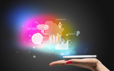 Woman hand with mobile phone on it