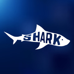 White shark silhouette with text inside. Logo concept