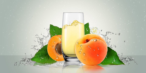 Apricot fruits with a glass of juice.