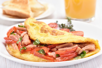 Omelette with vegetables and ham